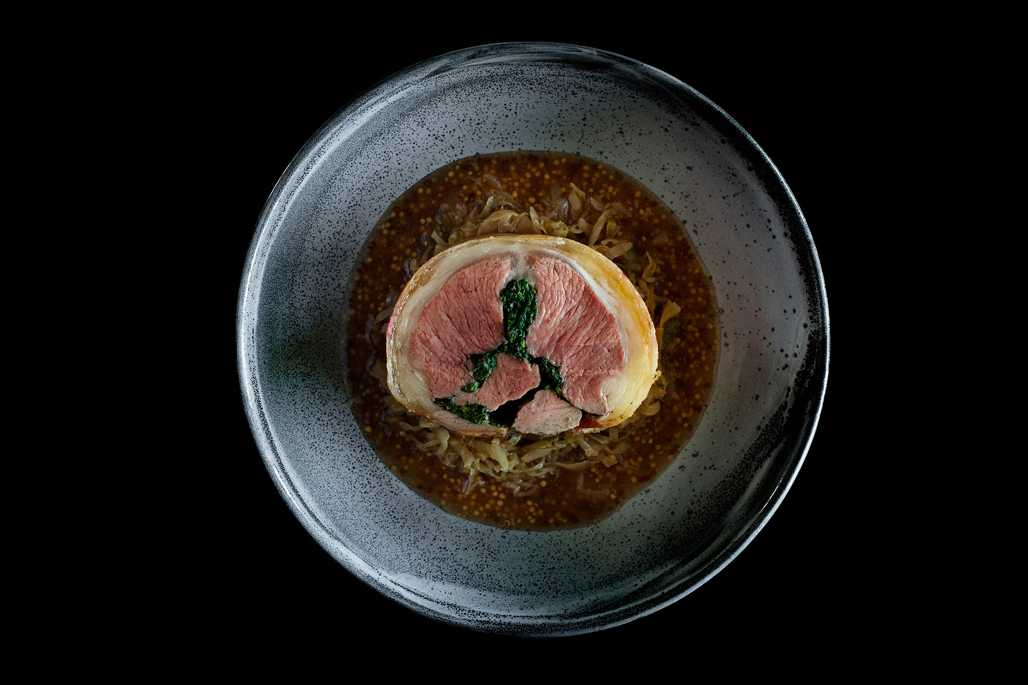 Rolled saddle of lamb with garden herbs, preserved sauerkraut and mustard sauce made from the whey of Margan’s cheese making process.