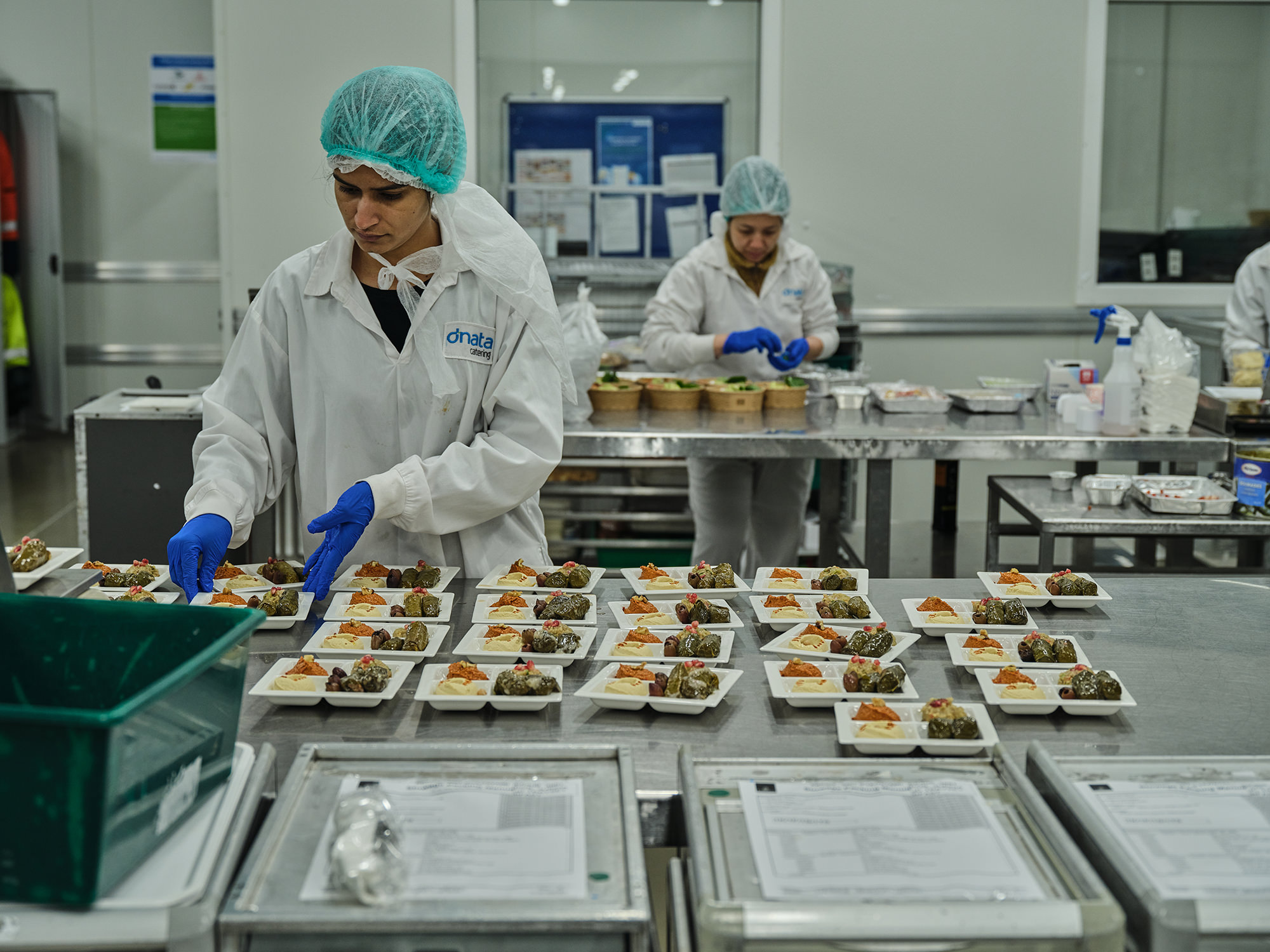 Inflight meals being prepared at dnata catering Melbourne.