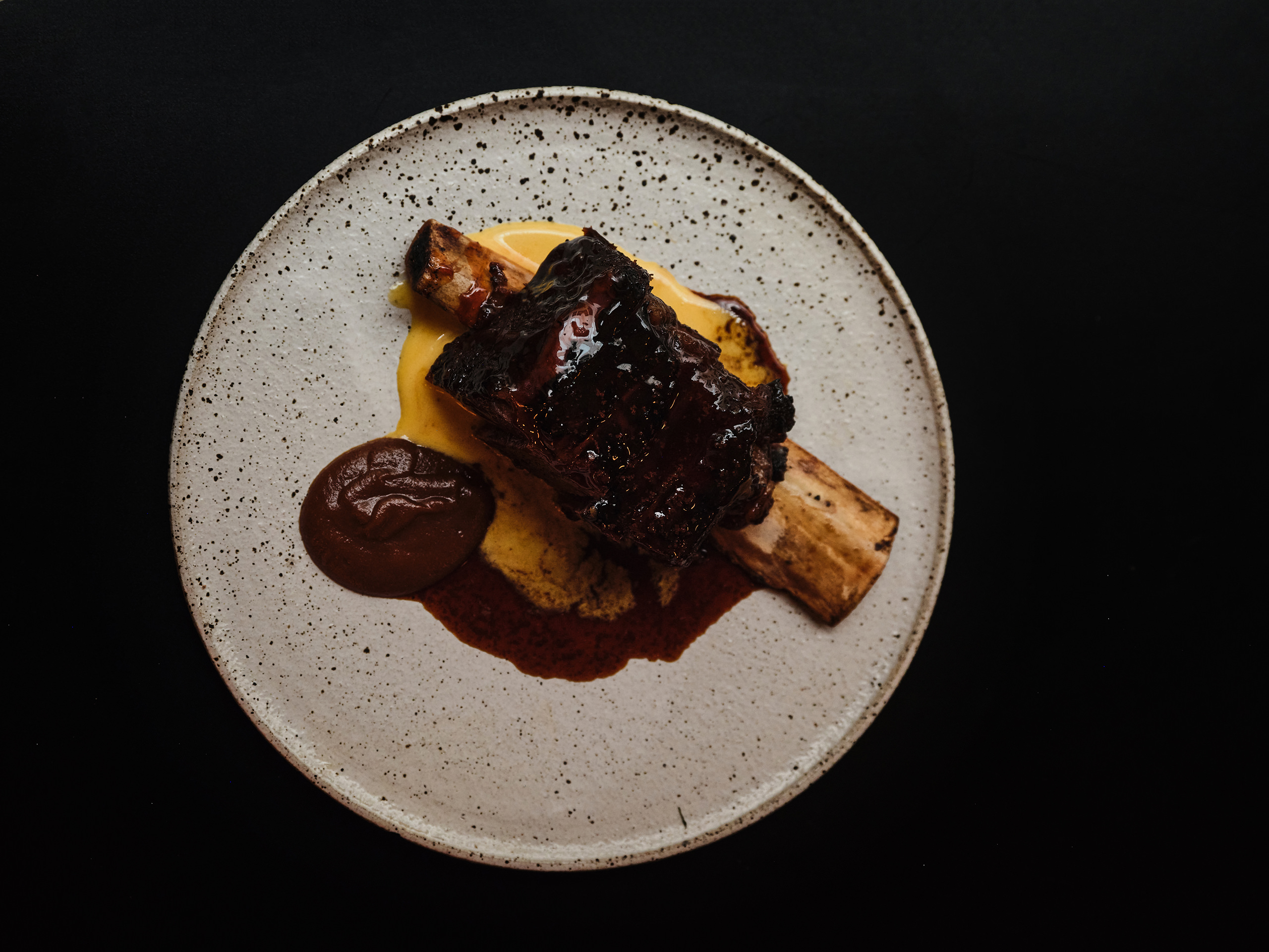 Wagyu short rib ‘Bistek’ with burnt onion jam and salted duck emulsion