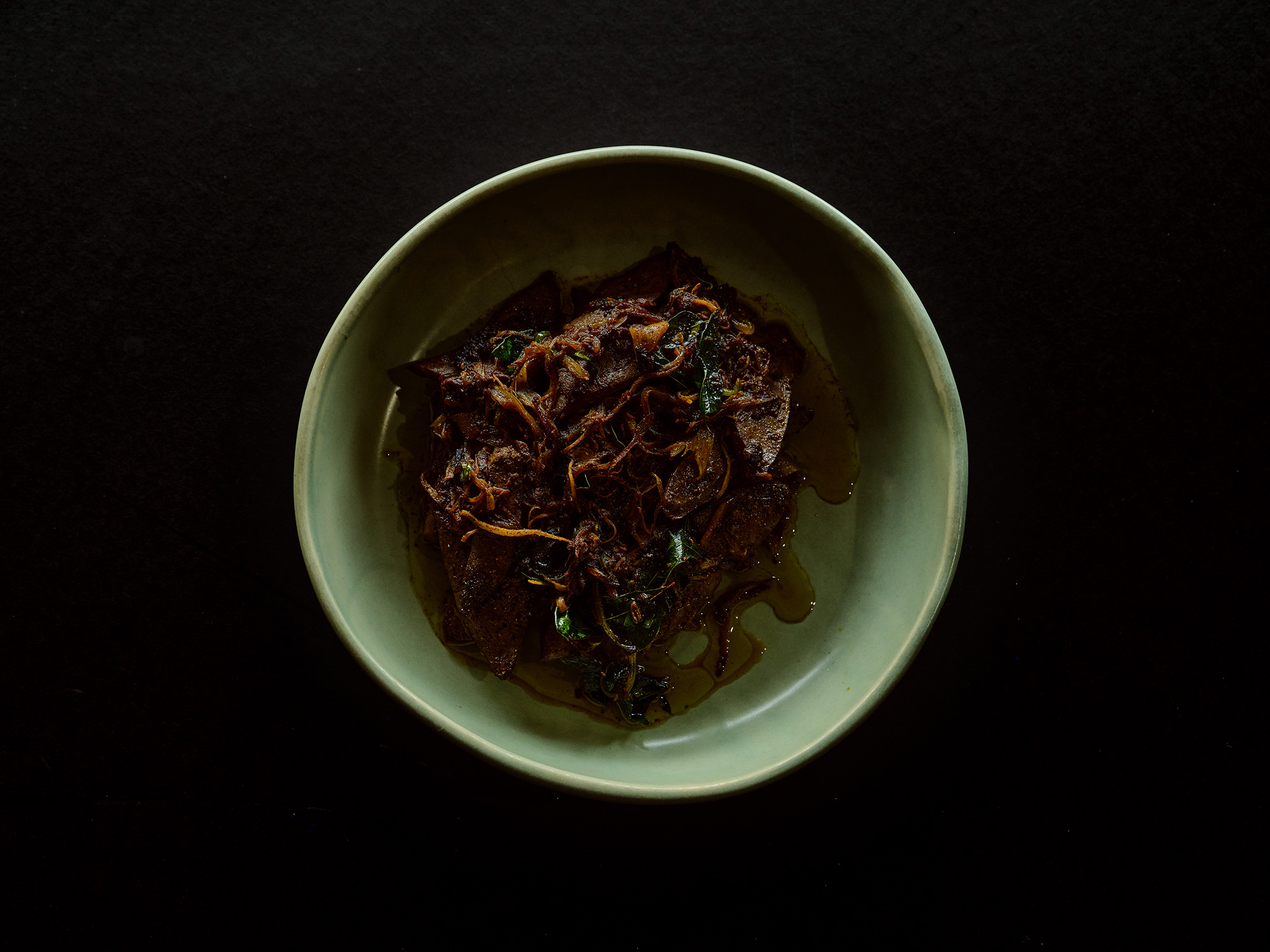 Stir fried goat liver with cumin and curry leaf at Manzé.