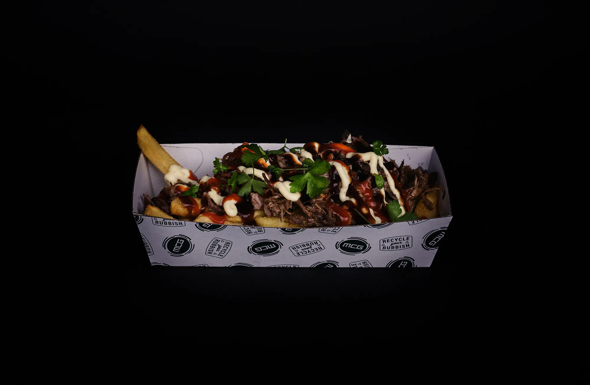 The HSP - a halal snack pack of golden fries topped with lamb at The Lamb Paddock