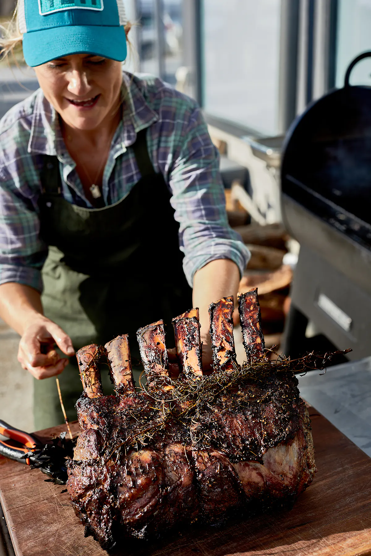Pip Sumbak prepares Quoin Farm beef for her Friday Night BBQ at Flinders Island Wharf